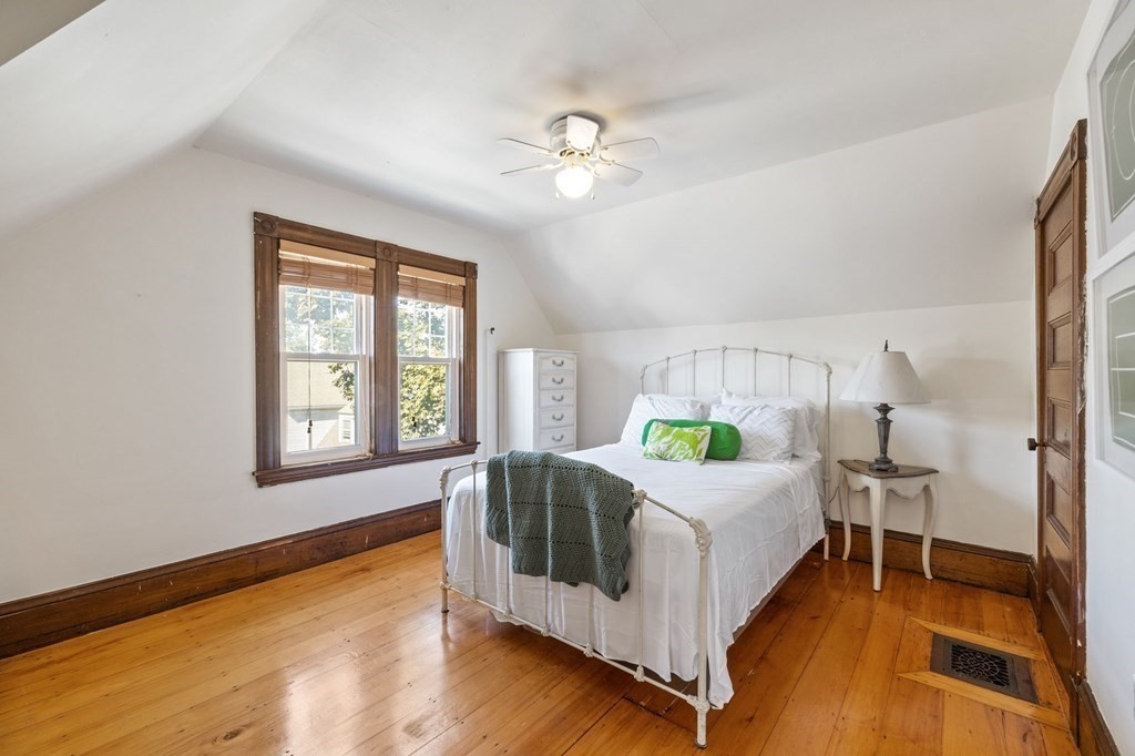 18 Alpha Road Boston, MA 02124 - Photo 34 of 42 a bedroom with a bed and a window