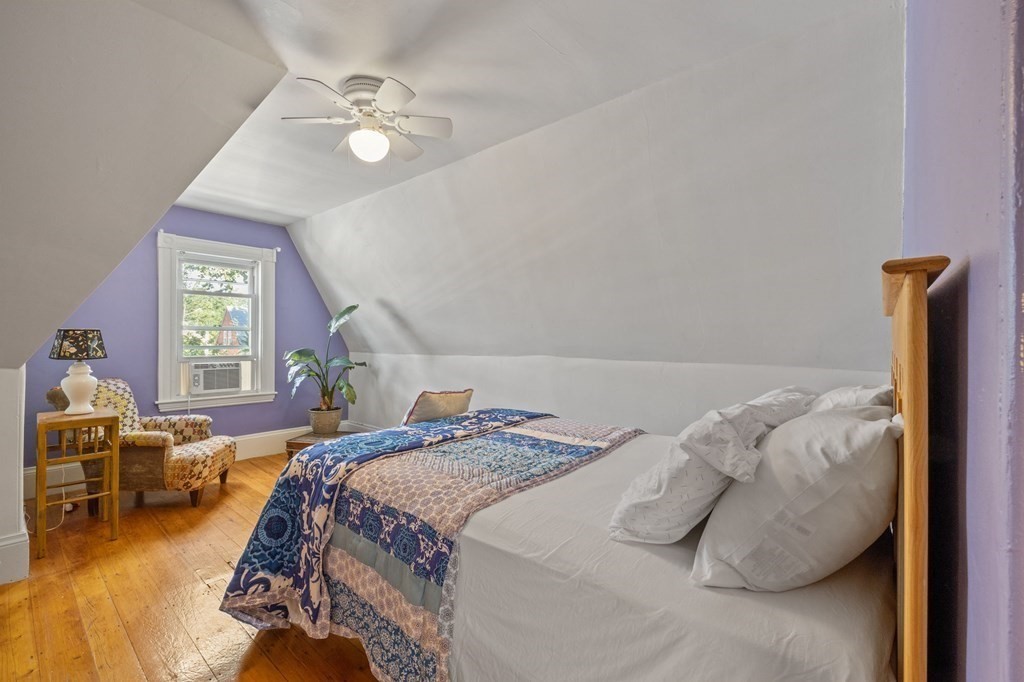 18 Alpha Road Boston, MA 02124 - Photo 36 of 42 a bedroom with a bed and window