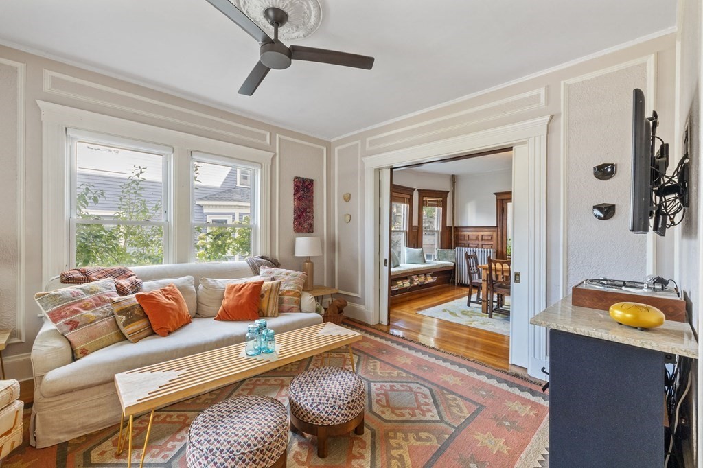 18 Alpha Road Boston, MA 02124 - Photo 4 of 42 a living room with furniture and a large window