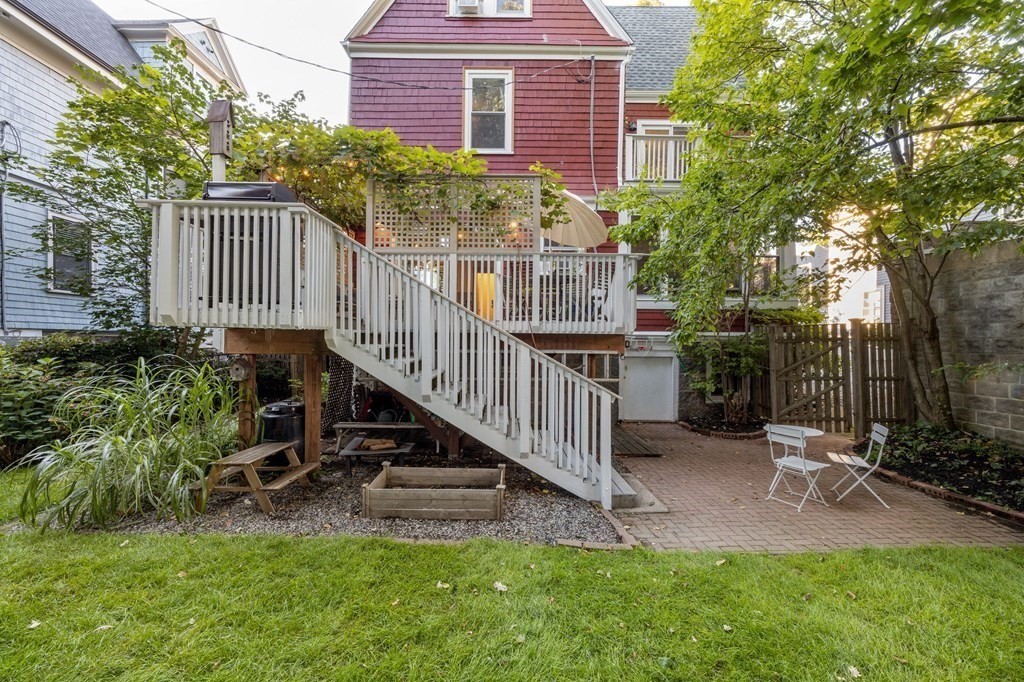 18 Alpha Road Boston, MA 02124 - Photo 41 of 42 a view of front of house with a yard