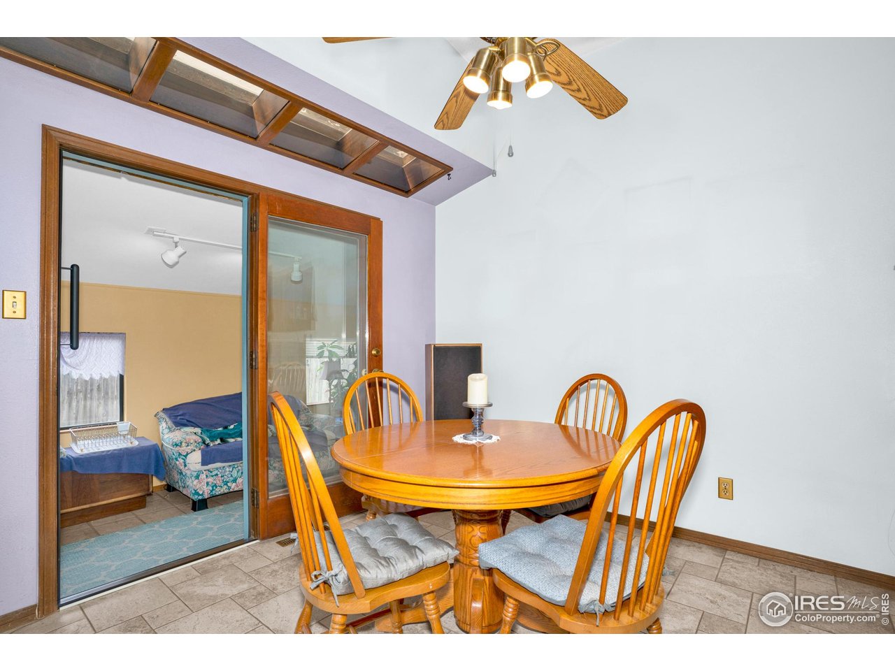 151 3rd Street Frederick, CO 80530 - Photo 12 of 45 a dining room with furniture and wooden floor