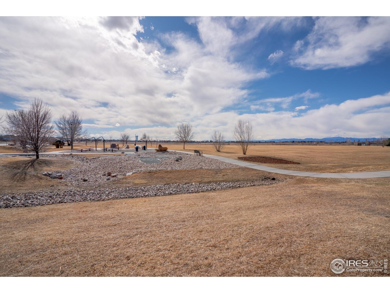 151 3rd Street Frederick, CO 80530 - Photo 34 of 45 a view of large space with beach and in background