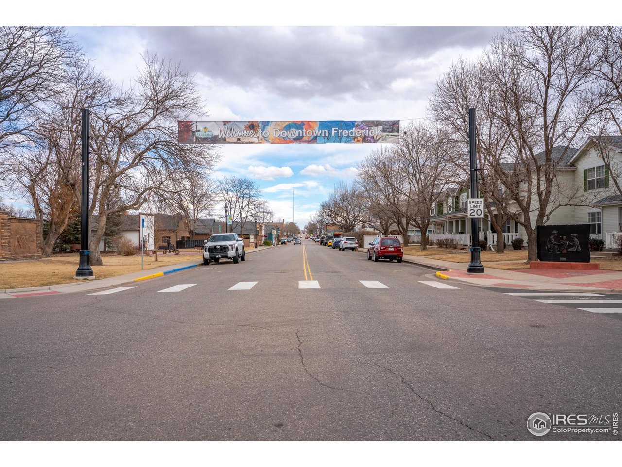 151 3rd Street Frederick, CO 80530 - Photo 39 of 45 a view of road with card parked on side and road