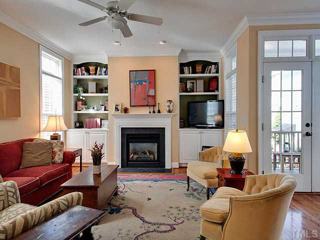1171 Harp Street Raleigh, NC 27604 - Photo 11 of 25 Beautiful living room with built in bookshelves and fireplace! Living Room