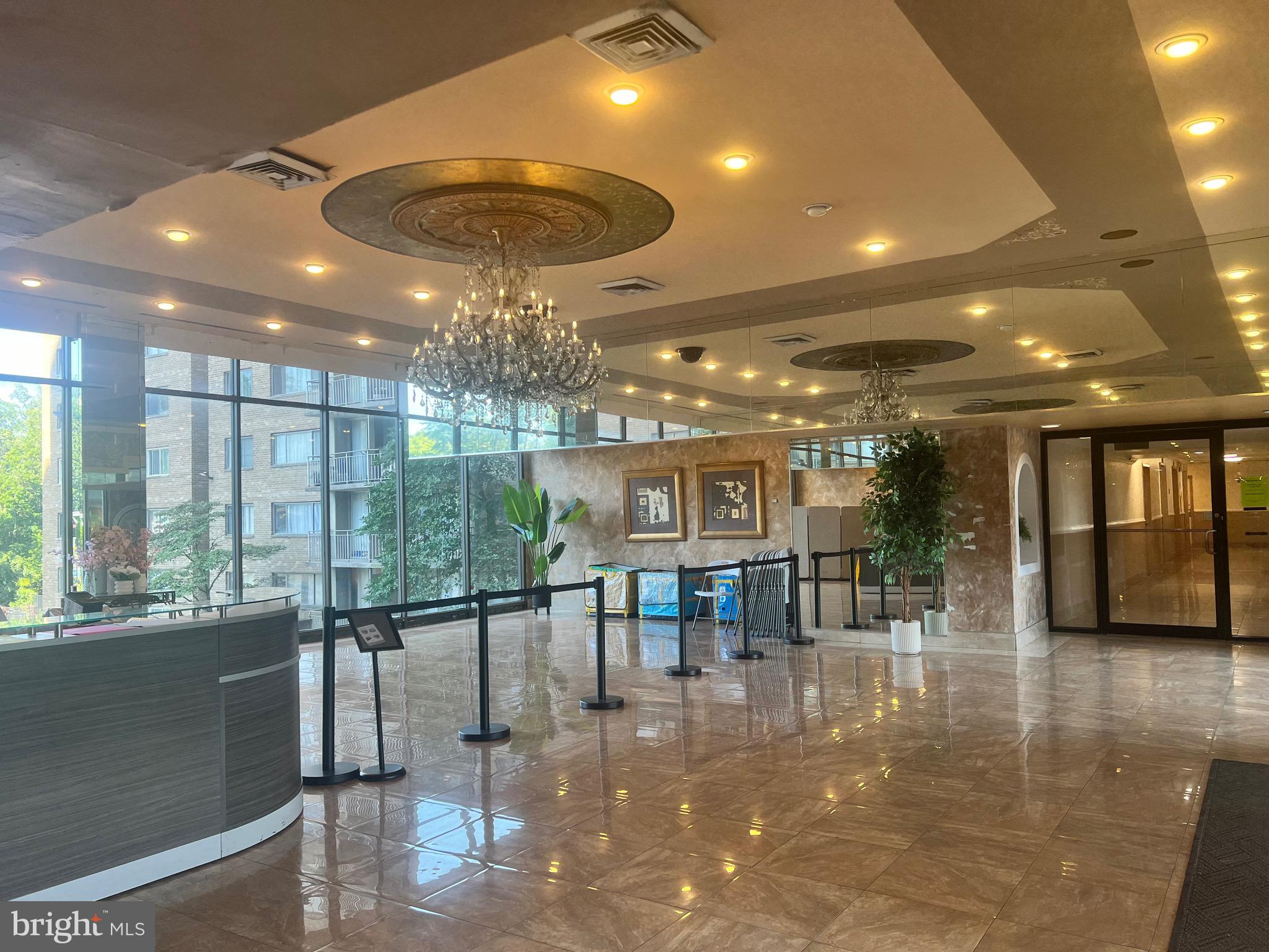 1836 Metzerott Road, Unit 1717 Hyattsville, MD 20783 - Photo 10 of 12 a view of a lobby with furniture