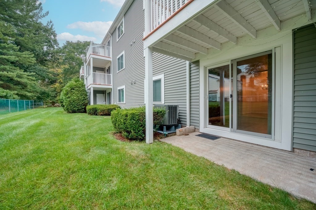 3 Post Oak Lane, Unit 4 Natick, MA 01760 - Photo 30 of 34 a view of a house with backyard and garden