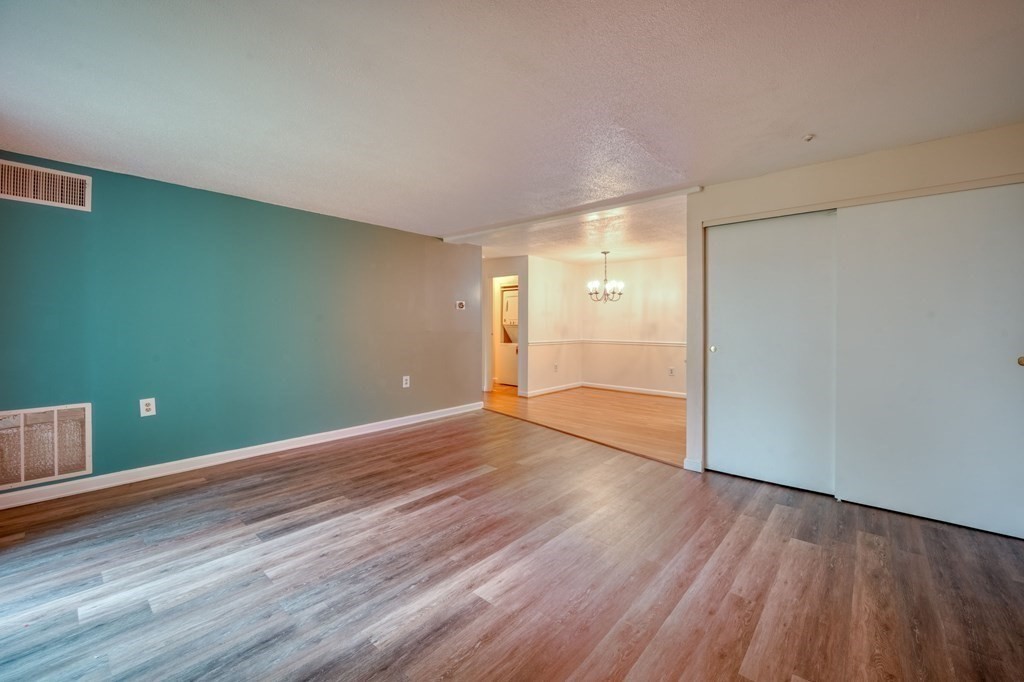 3 Post Oak Lane, Unit 4 Natick, MA 01760 - Photo 3 of 34 a view of a room with wooden floor