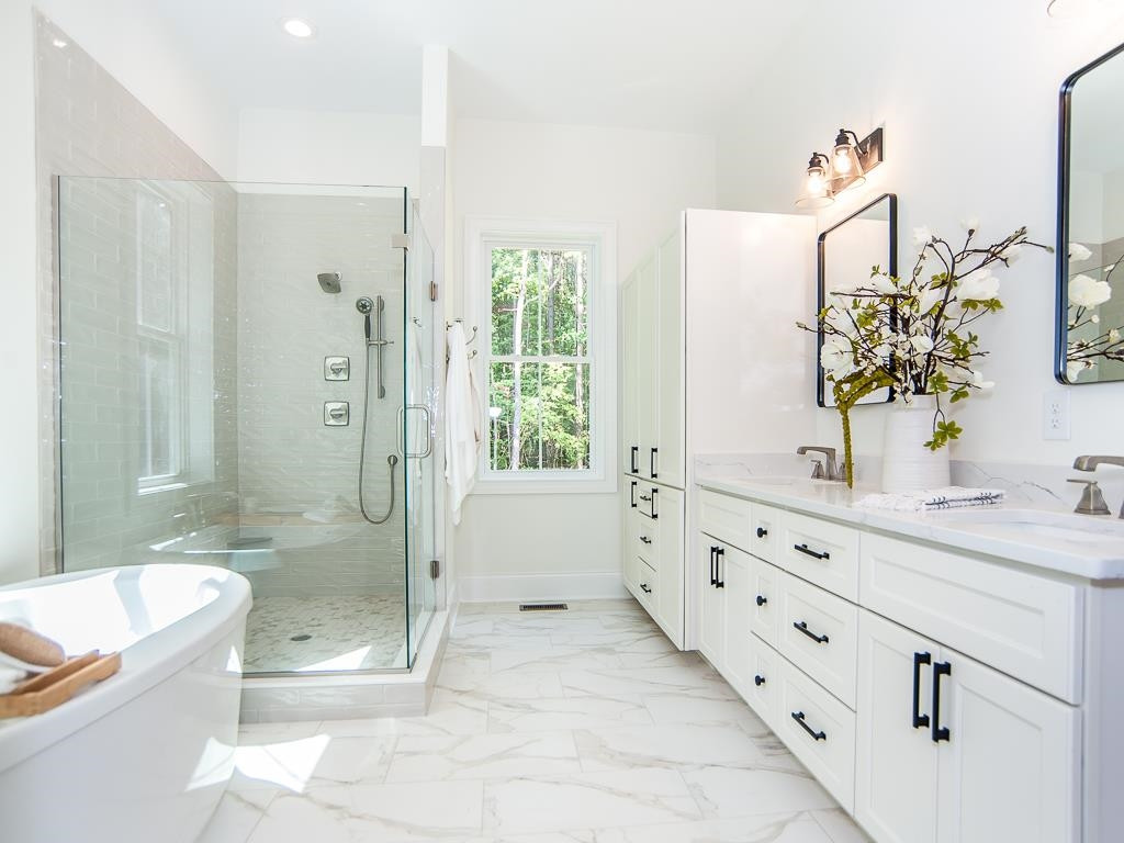 1619 Milton Road Durham, NC 27712 - Photo 21 of 38 Spa shower w/ separate tub - lots of storage Master Bath/Spa