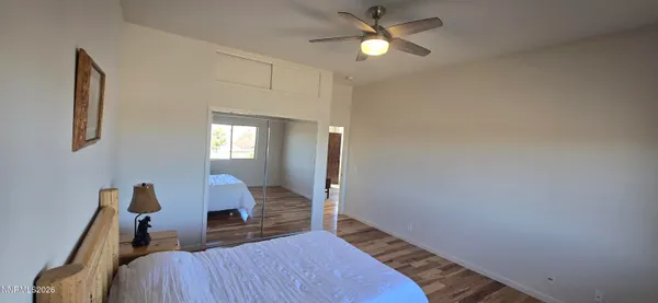 a view of storage and utility room with a washer dryer