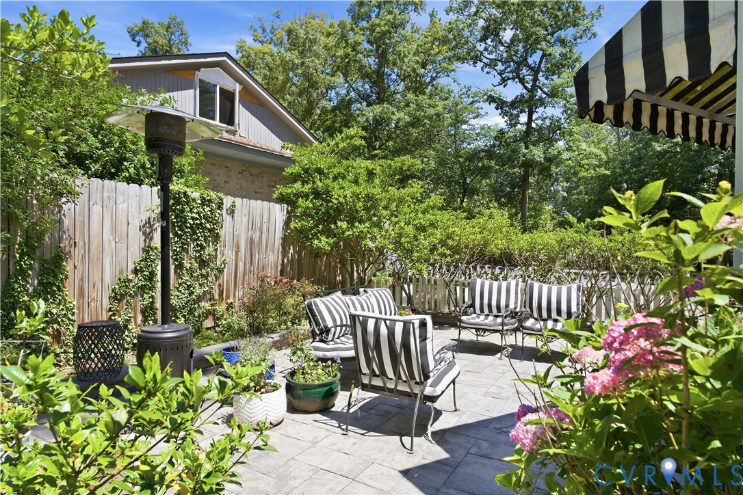 6405 Buckhill Road Richmond, VA 23225 - Photo 46 of 71 Paved patio area featuring lush surrounding foliag