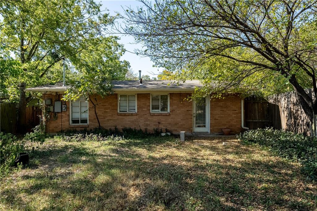 3705 Tower View Court Austin, TX 78723 - Photo 13 of 15 a view of a house with a yard