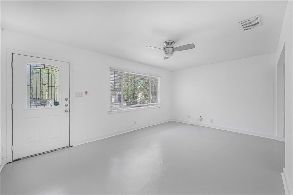 3705 Tower View Court Austin, TX 78723 - Photo 5 of 15 a view of an empty room with a window