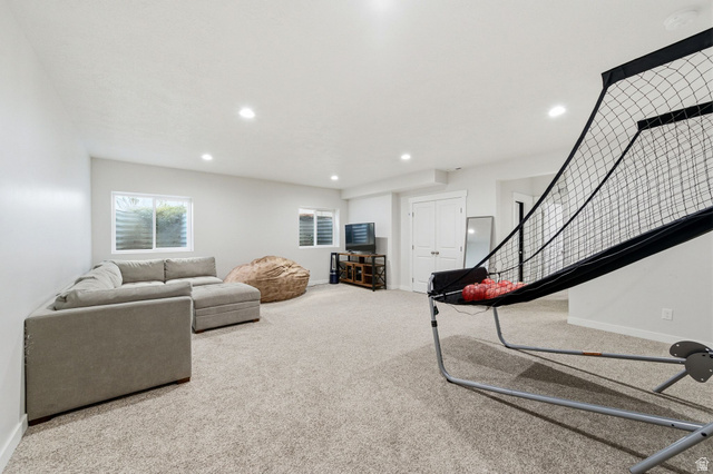 1038 South Old Towne Road Layton, UT 84041 - Photo 19 of 39 Spacious carpeted room featuring recessed lighting, white walls, and multiple windows with white blinds