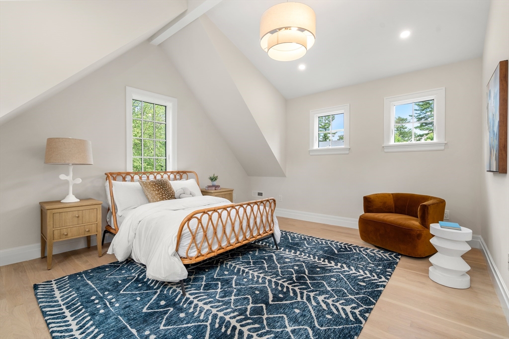 28 Parker Road Wellesley, MA 02482 - Photo 26 of 32 a bedroom with a bed and wooden floor