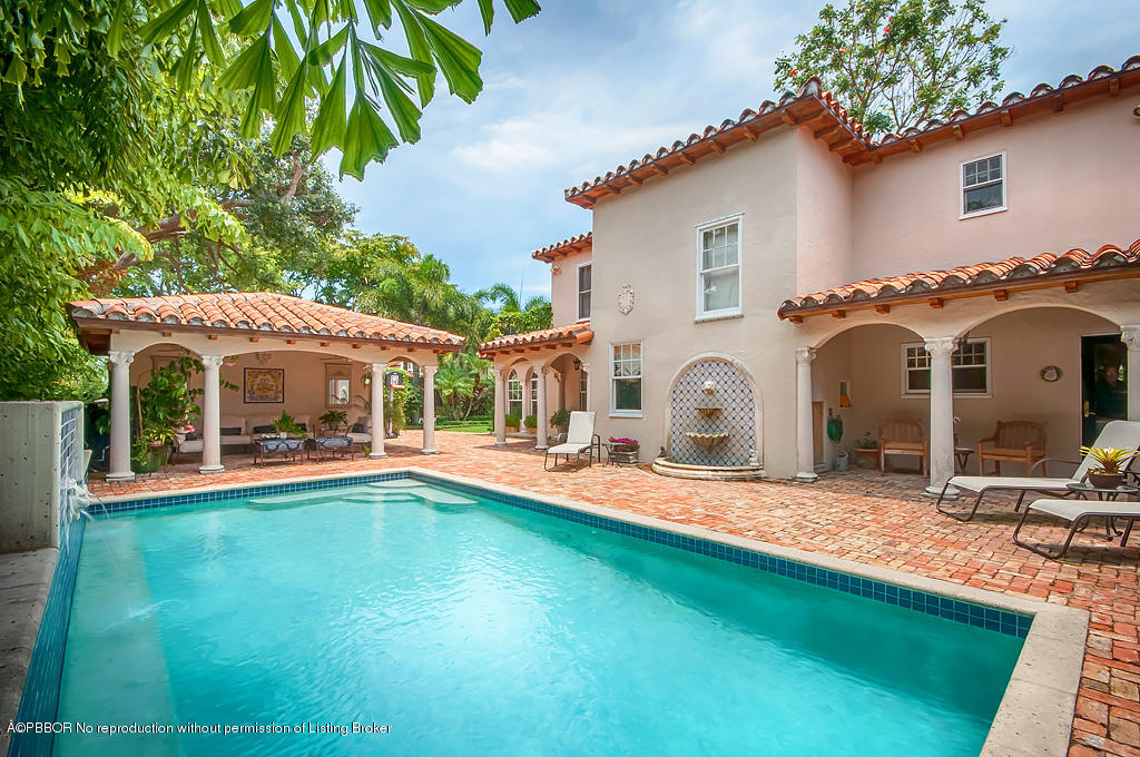 282 Barcelona Road West Palm Beach, FL 33401 - Photo 2 of 32 a front view of a house with yard porch and furniture