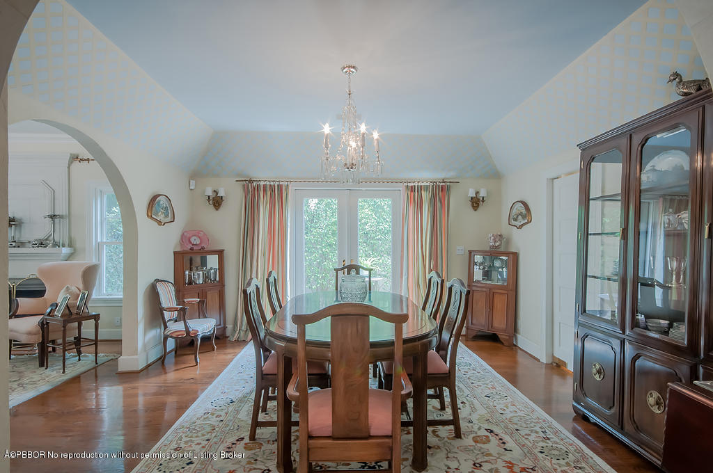 282 Barcelona Road West Palm Beach, FL 33401 - Photo 12 of 32 a view of a dining room with furniture window and wooden floor