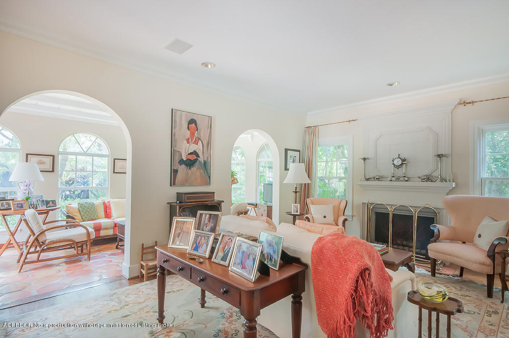 282 Barcelona Road West Palm Beach, FL 33401 - Photo 15 of 32 a living room with furniture fireplace and a large window