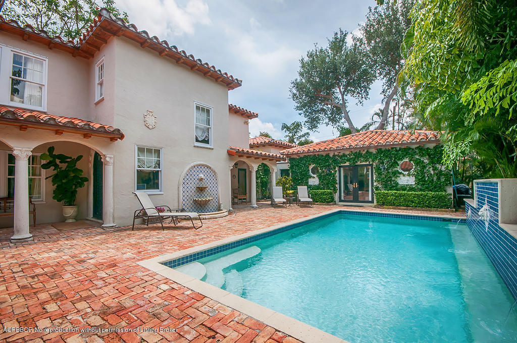 282 Barcelona Road West Palm Beach, FL 33401 - Photo 25 of 32 a view of a house with backyard and sitting area