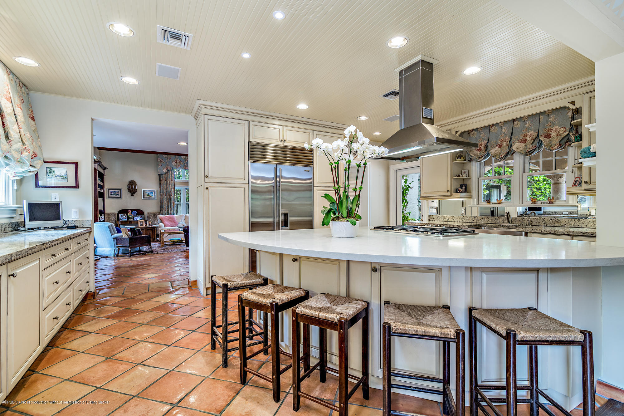 282 Barcelona Road West Palm Beach, FL 33401 - Photo 7 of 32 a large kitchen with a table and chairs in it