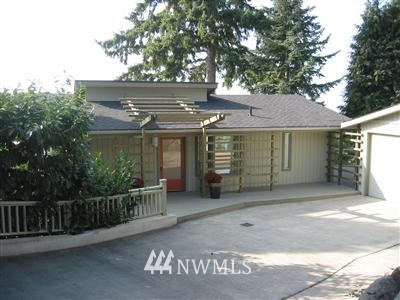 a view of a house with a garage