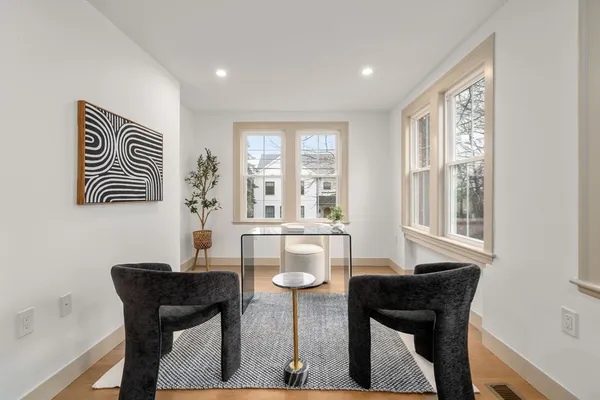 a view of a dining room with furniture window and outside view