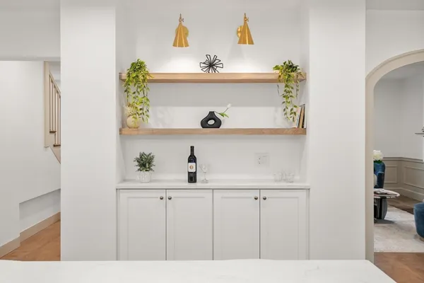 a kitchen with a sink and cabinets