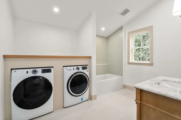 a utility room with dryer and washer