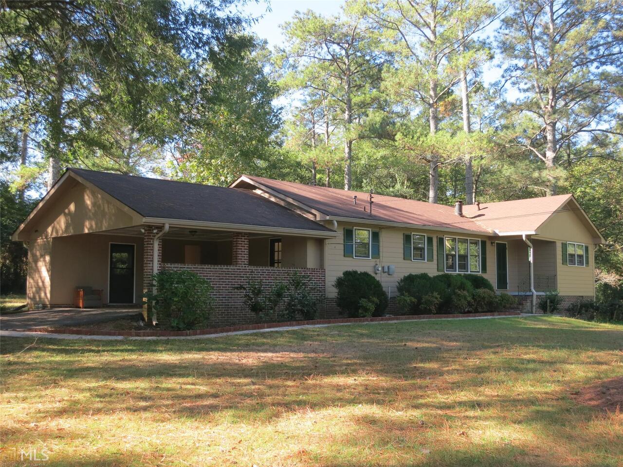 8 Barnesdale Way Northeast Rome, GA 30161 - Photo 1 of 1 a view of a yard in front of house