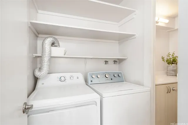 a utility room with dryer and washer