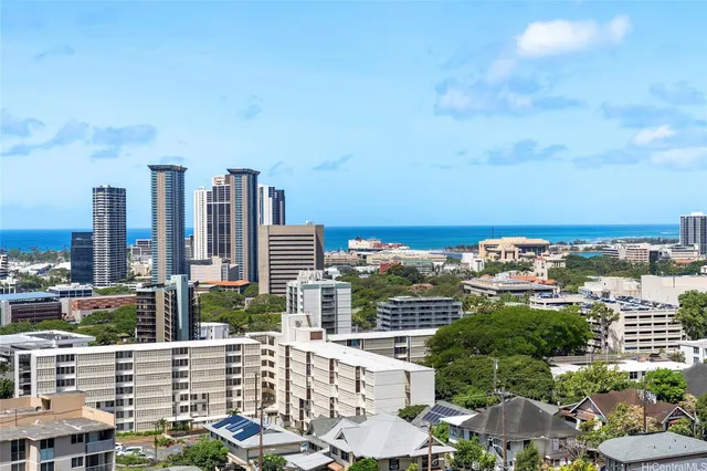 a view of city with tall buildings
