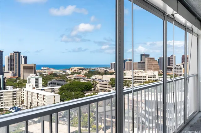 a view of a balcony with city