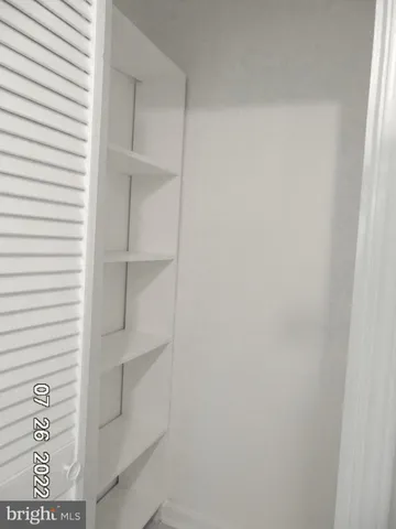 a view of a yard with an outdoor seating