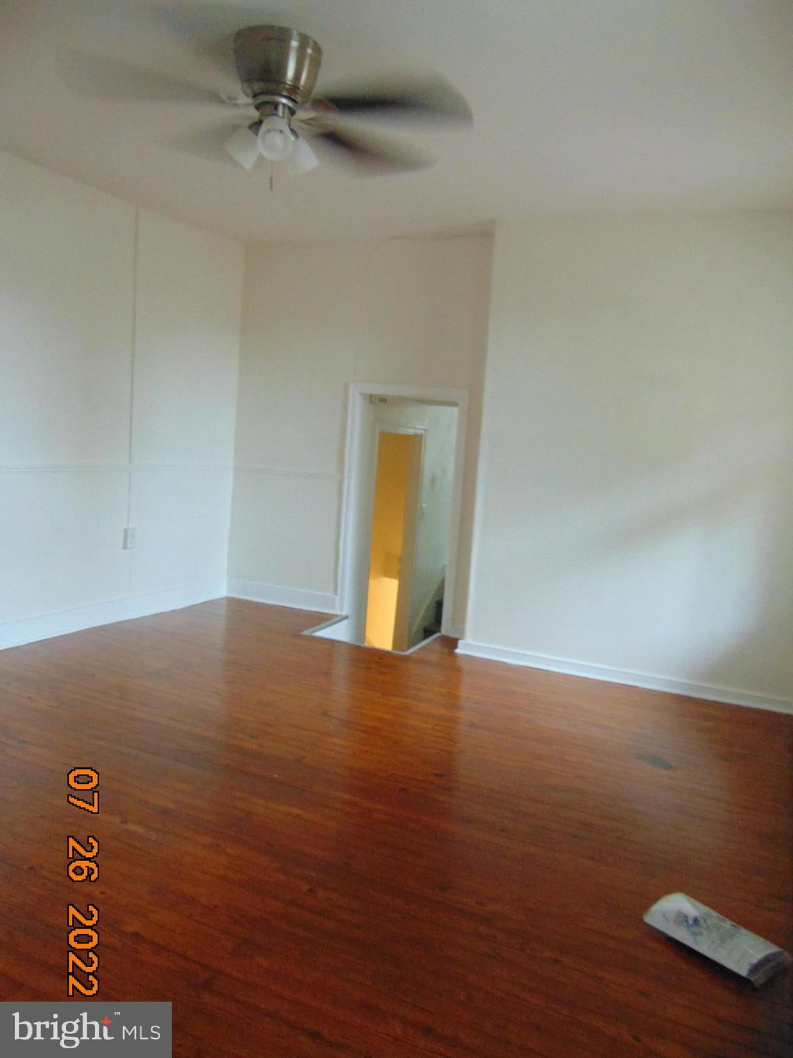 140 West South Street Frederick, MD 21701 - Photo 26 of 33 an empty room with a empty space and wooden floor