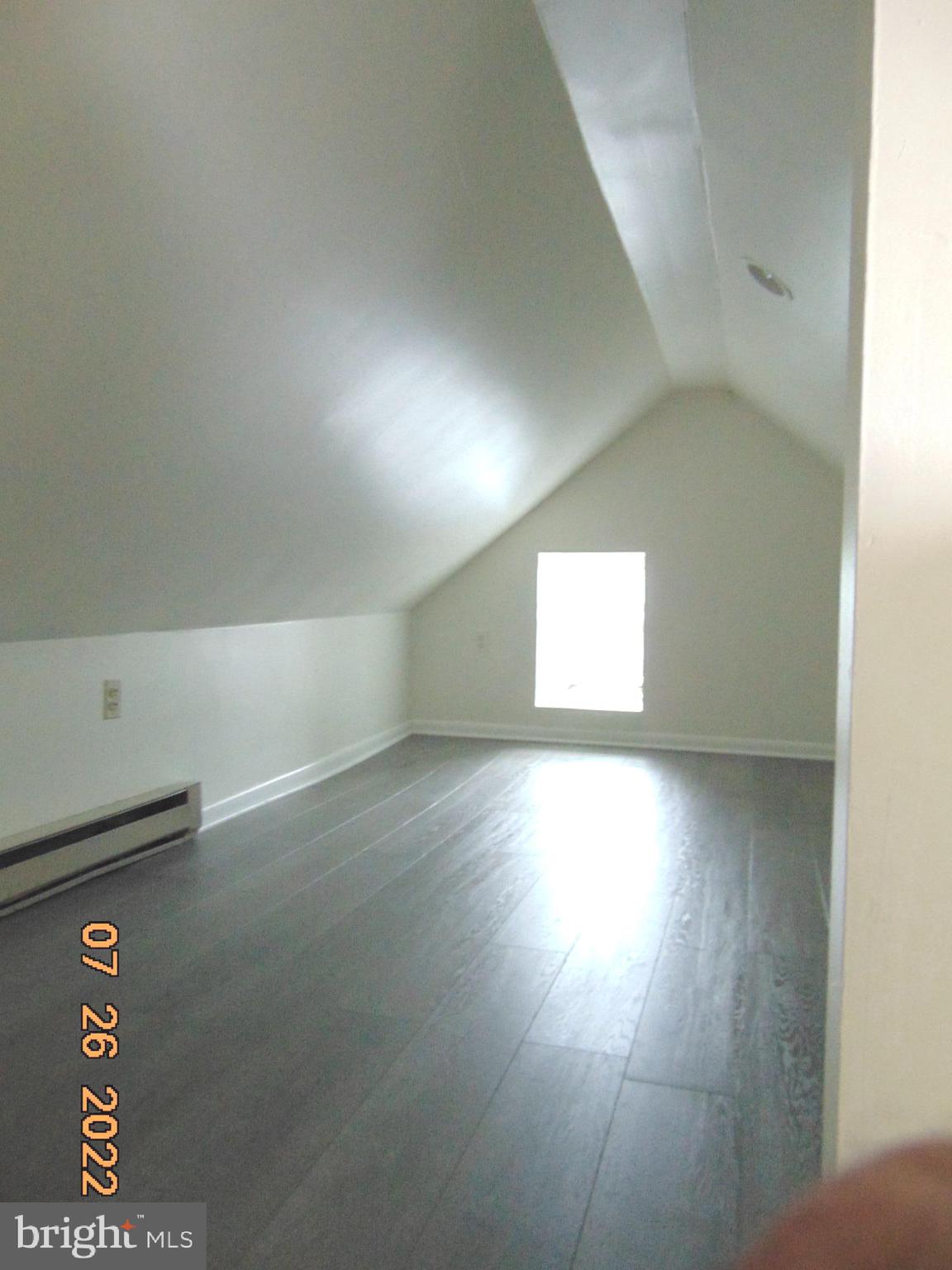 140 West South Street Frederick, MD 21701 - Photo 3 of 33 an empty room with windows