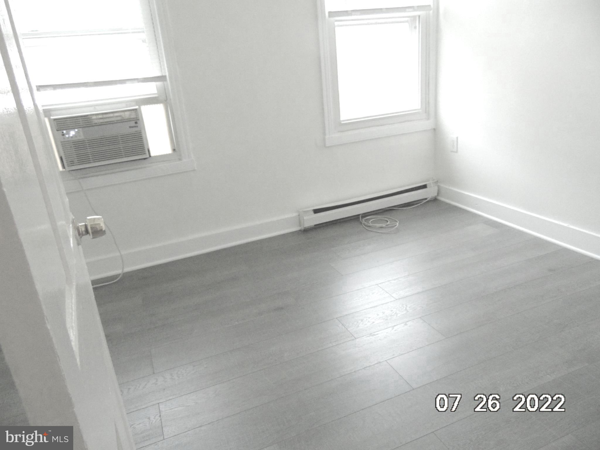 140 West South Street Frederick, MD 21701 - Photo 5 of 33 an empty room with a window