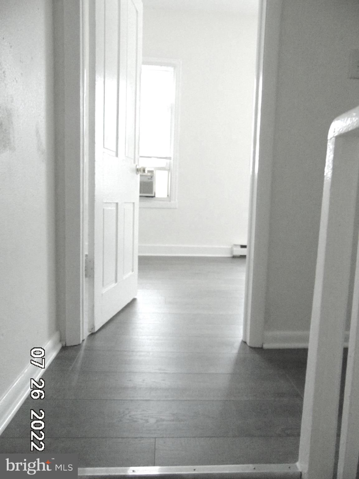 140 West South Street Frederick, MD 21701 - Photo 7 of 33 a view of empty room with wooden floor