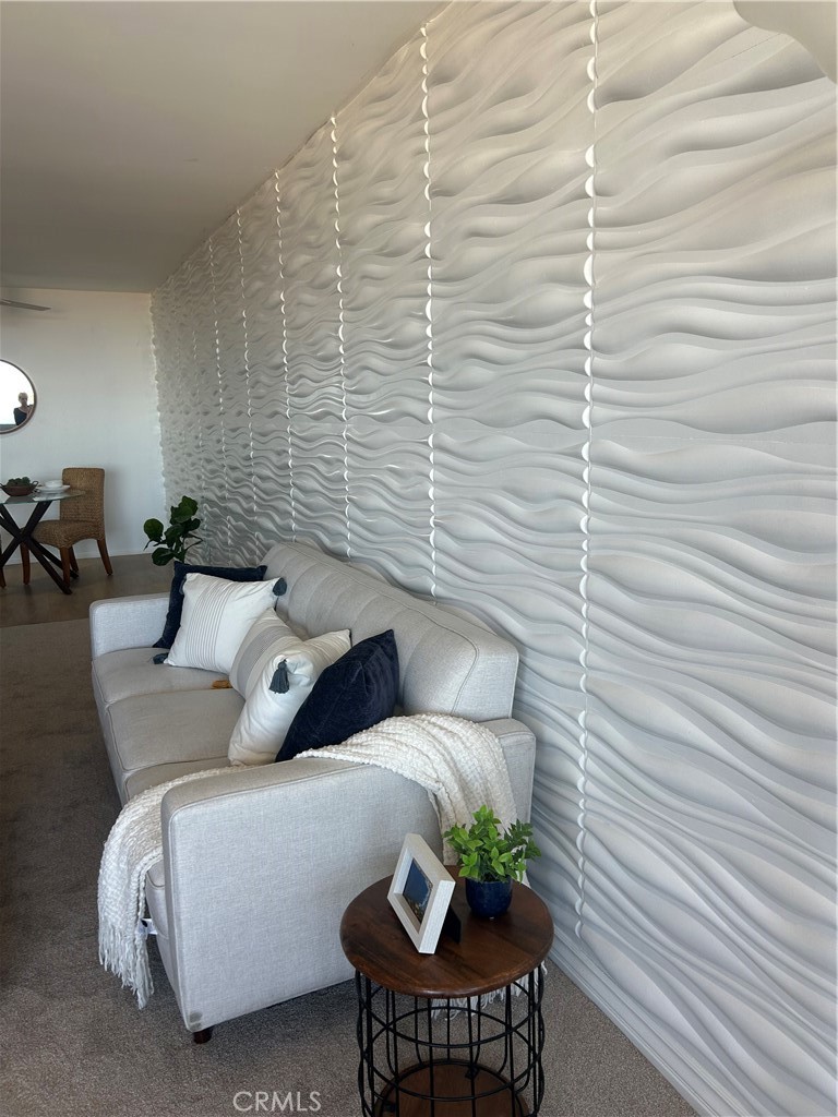 28121 Highridge Road, Unit 402 Rancho Palos Verdes, CA 90275 - Photo 13 of 39 a bedroom with a bed and a chair