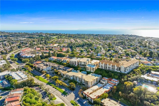 an aerial view of a city with lots of residential buildings