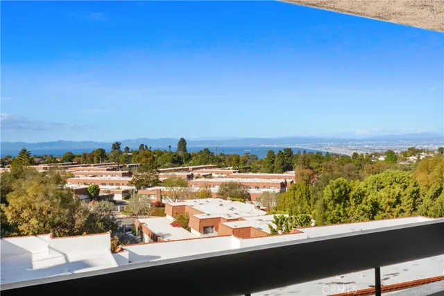 a view of a lake from a balcony