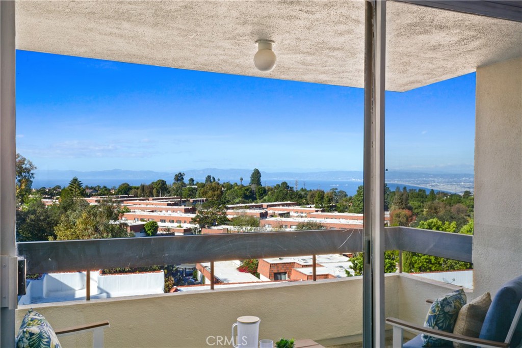 28121 Highridge Road, Unit 402 Rancho Palos Verdes, CA 90275 - Photo 8 of 39 a view of a lake from a balcony
