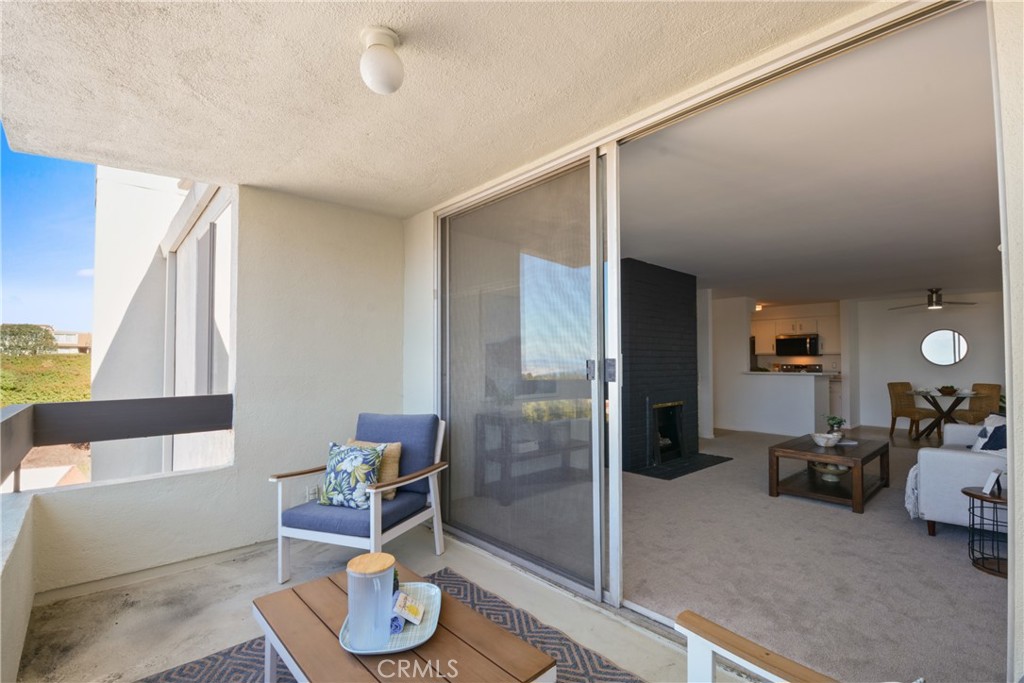 28121 Highridge Road, Unit 402 Rancho Palos Verdes, CA 90275 - Photo 9 of 38 a living room with furniture and a wooden floor