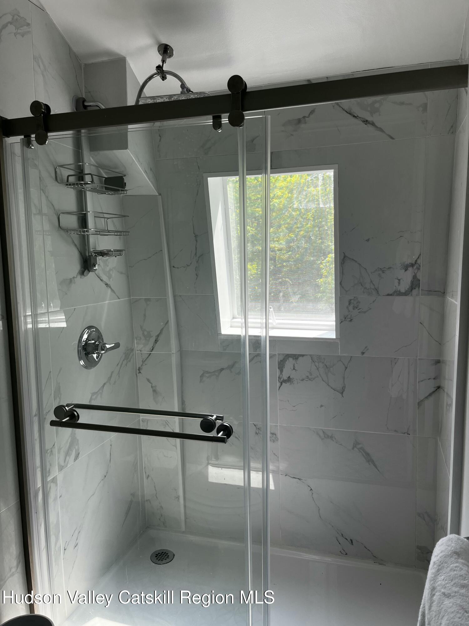 20 Tannery Brook Road, Unit 6 Woodstock, NY 12498 - Photo 9 of 12 a bathroom with a shower