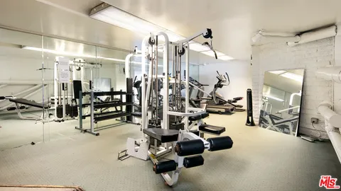 a view of a room with gym equipment