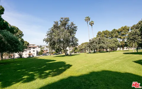 a view of a golf course with a lake
