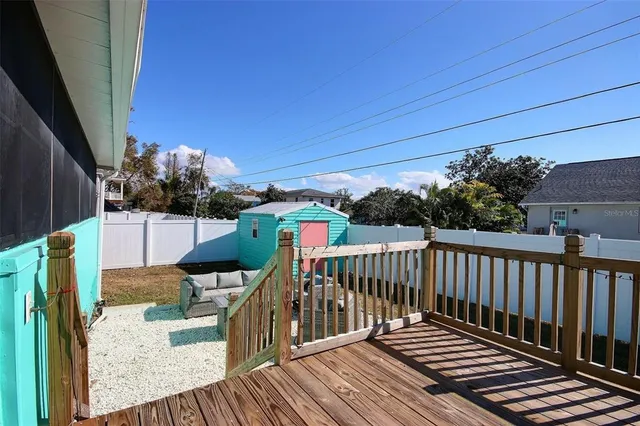 a view of a chairs on the roof deck
