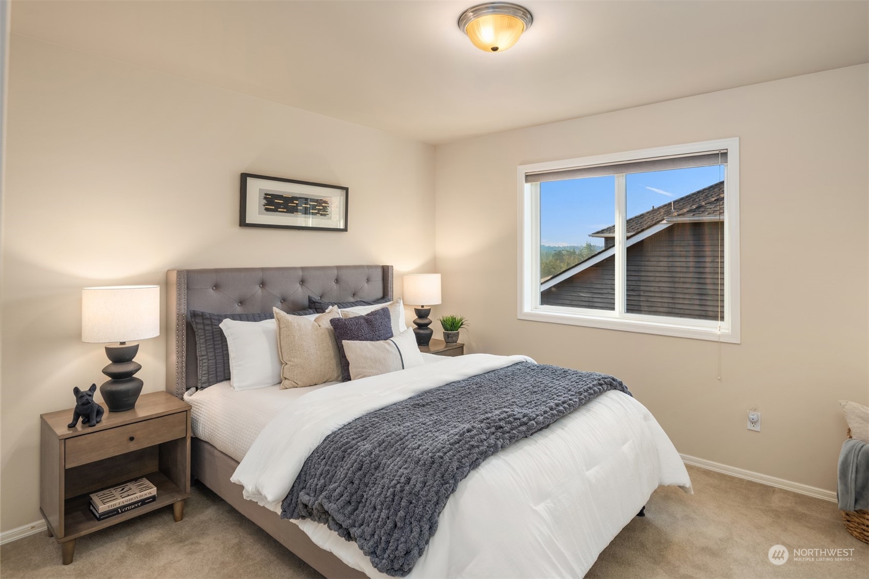 2210 242nd Street Southeast Bothell, WA 98021 - Photo 14 of 40 a bedroom with a bed and a window