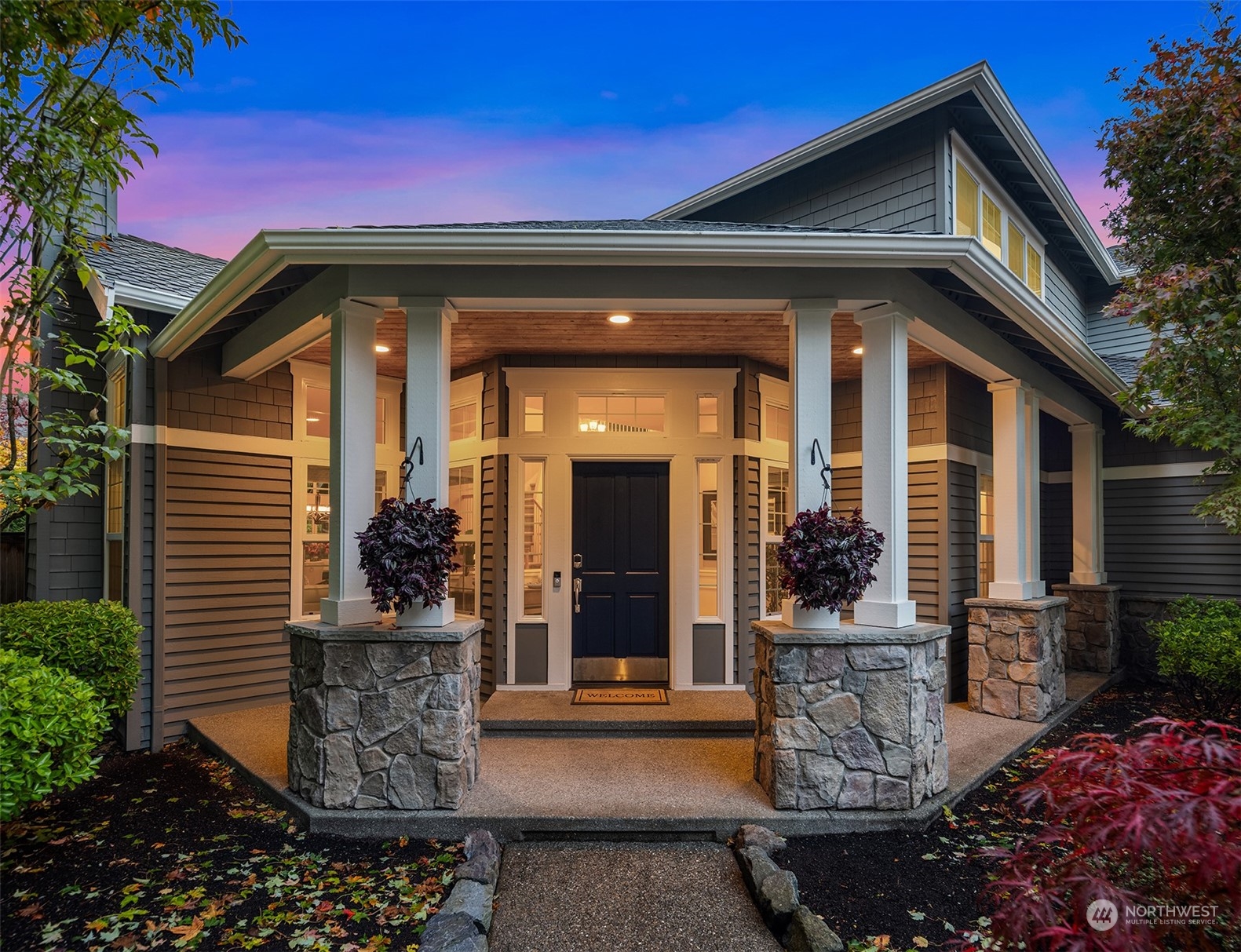 2210 242nd Street Southeast Bothell, WA 98021 - Photo 17 of 40 a front view of a house with garden
