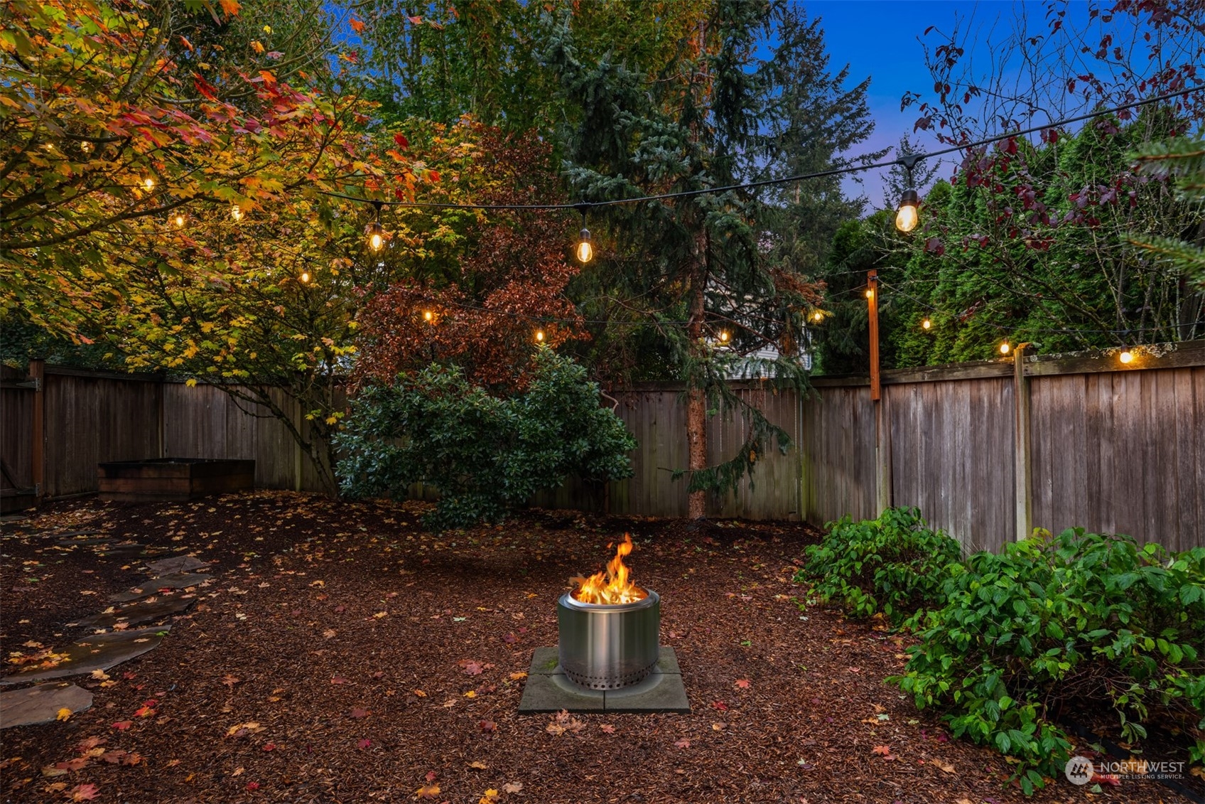 2210 242nd Street Southeast Bothell, WA 98021 - Photo 22 of 40 a view of a backyard with tree s