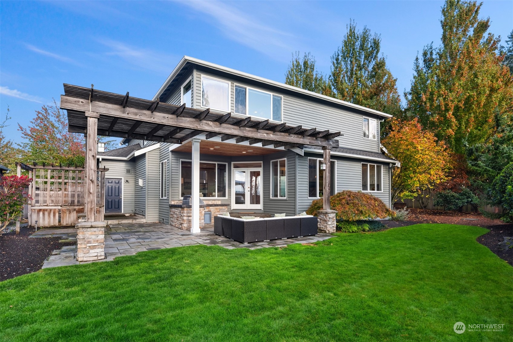 2210 242nd Street Southeast Bothell, WA 98021 - Photo 26 of 40 a front view of a house with a yard