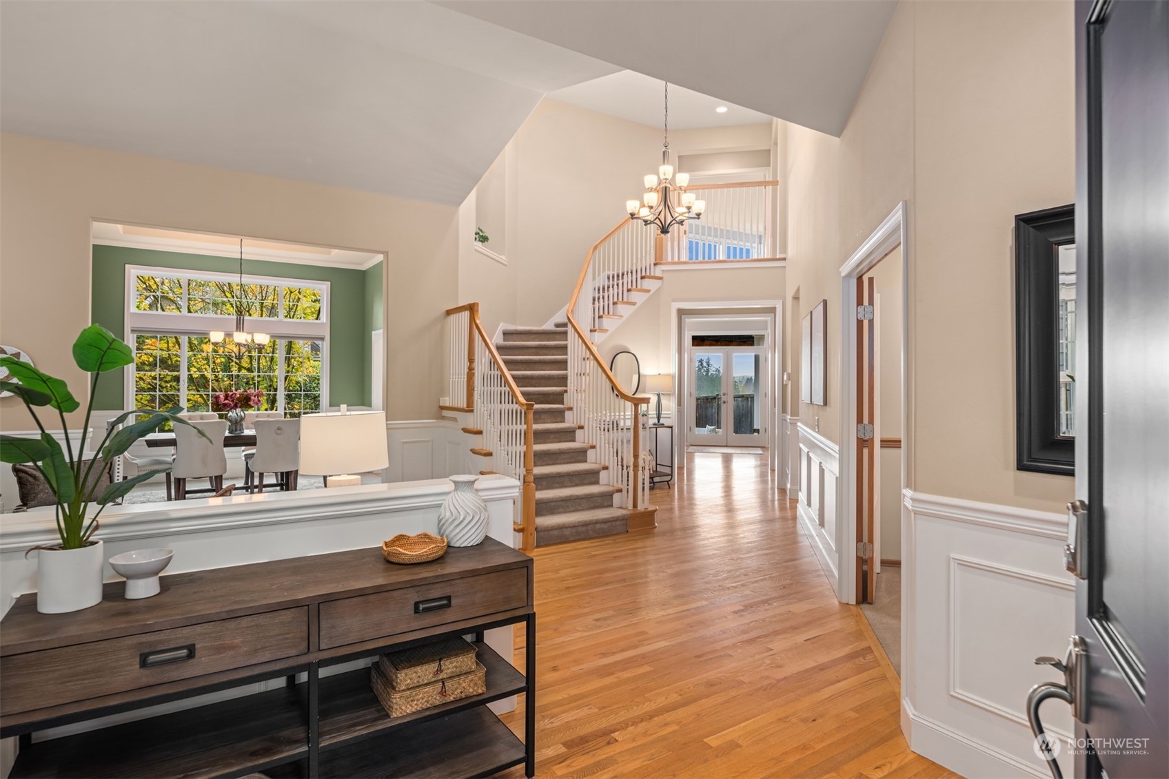 2210 242nd Street Southeast Bothell, WA 98021 - Photo 29 of 40 a living room with furniture a fireplace and wooden floor